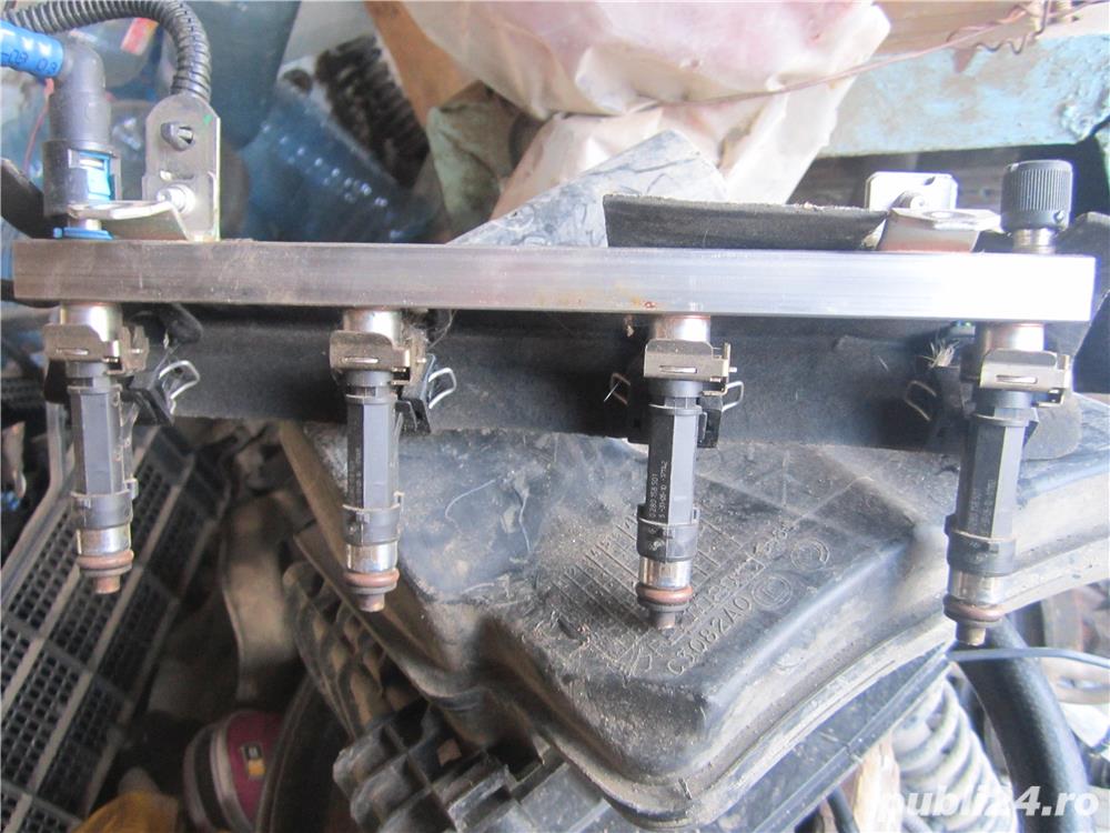 Injectoare Opel Astra h 1.4