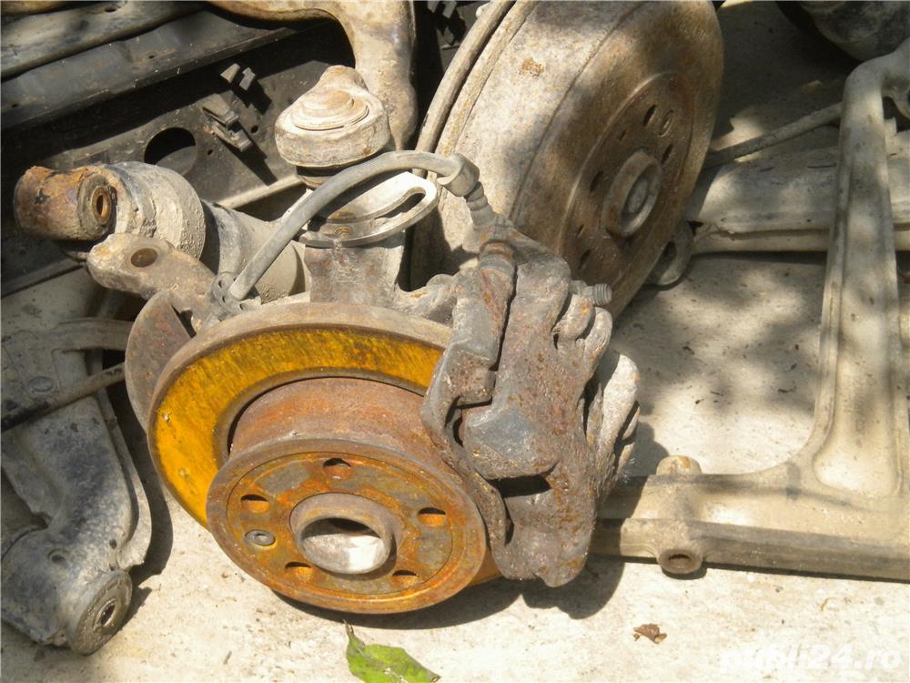 vand fuzeta cu disc de frana si etrier de vw.t4 vand fuzeta cu disc de frana si etrier de vw.t4