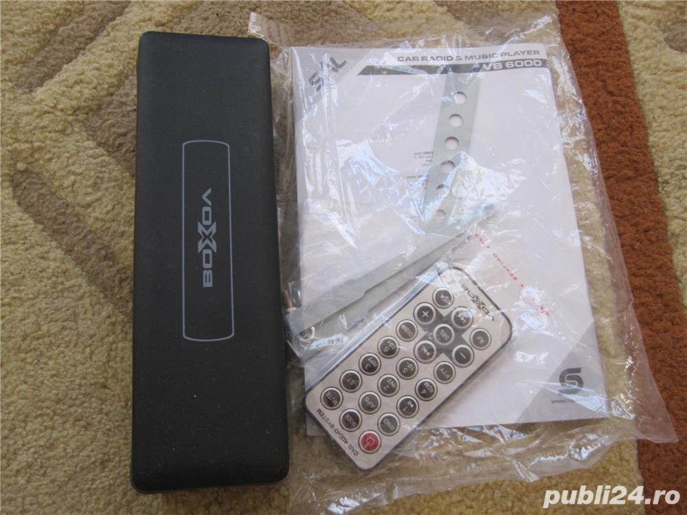 Telecomanda+Caseta  protectie fata player auto VB6000