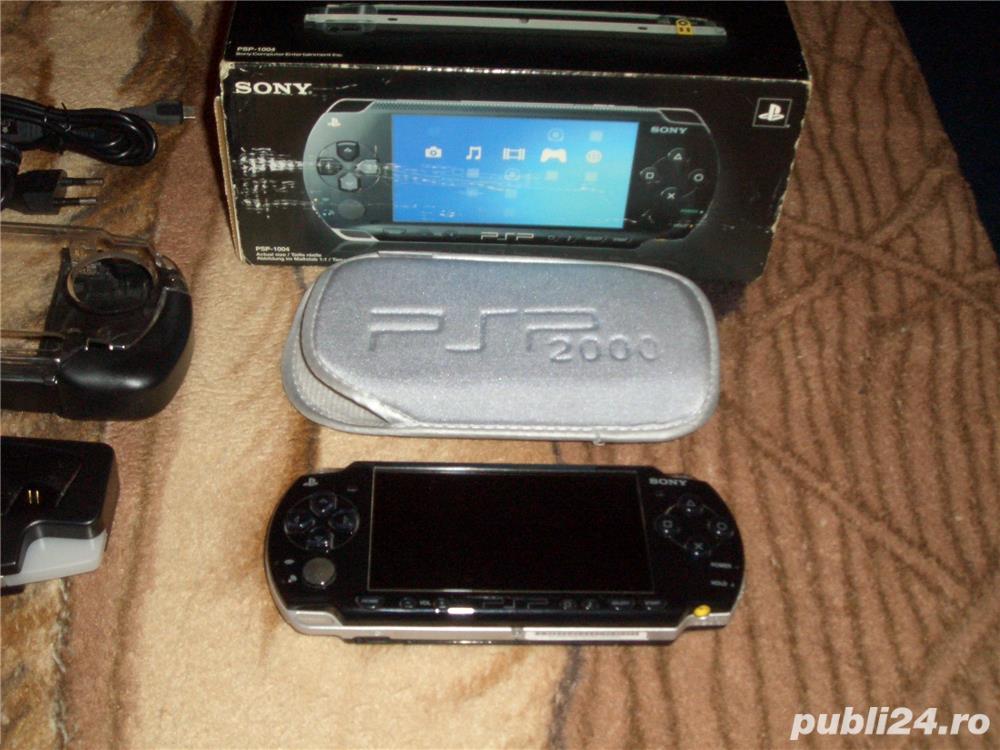 Sony PSP 12 jocuri Originale + un film nenumarate accesorii  consola la cutie (schimb)