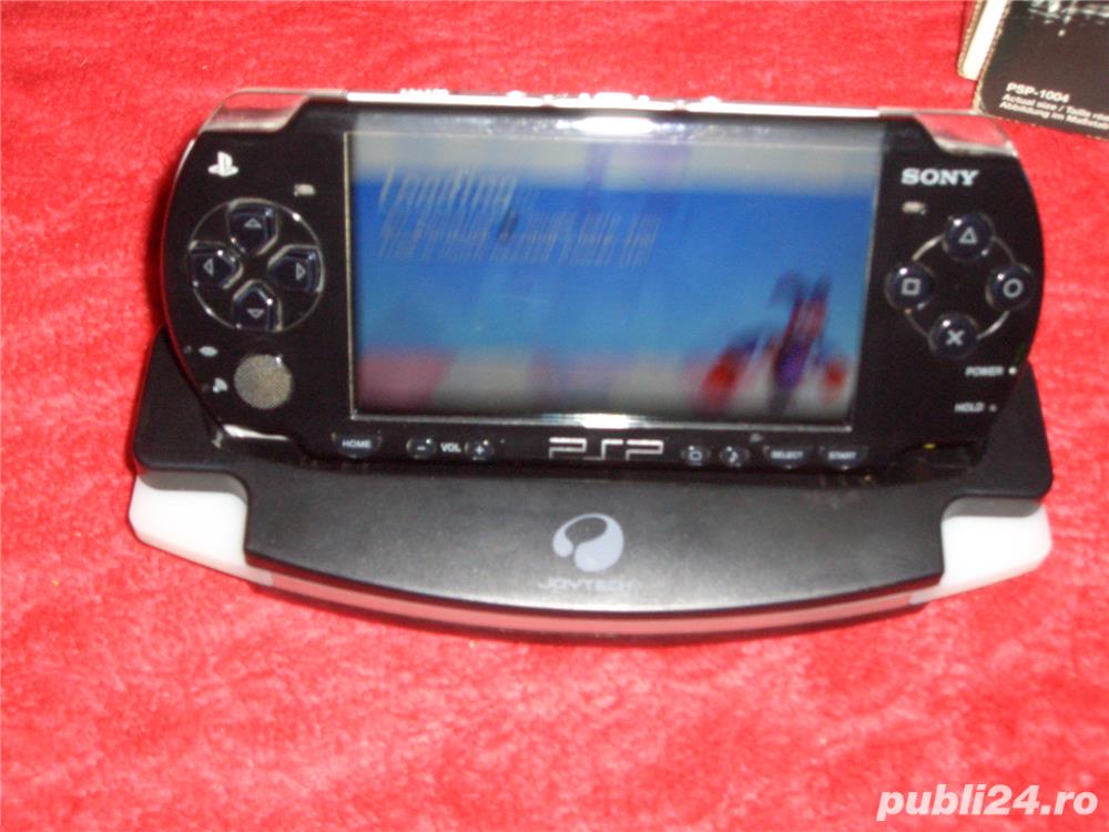 Sony psp la cutie + 12 jocuri originale la cutie +toate accesorile (schimb)