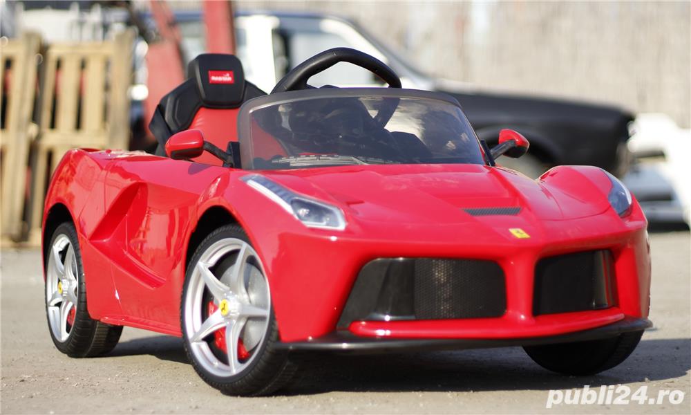 Masinuta electrica Laferrari 2x 25W 12V cu USI Flutere, Mp3 , Scaun tapitat Masinuta electrica Laferrari 2x 25W 12V cu USI Flutere, Mp3 , Scaun tapitat