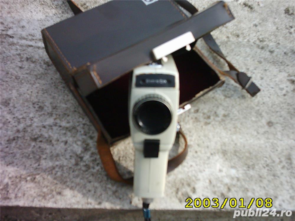 Camera de filmat veche, deosebita, unica Camera de filmat veche, deosebita, unica