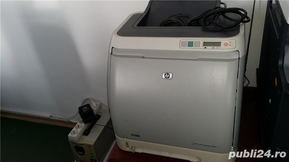 Vand imprimanta HP Laserjet 2600 n cu doua seturi cartuse HP