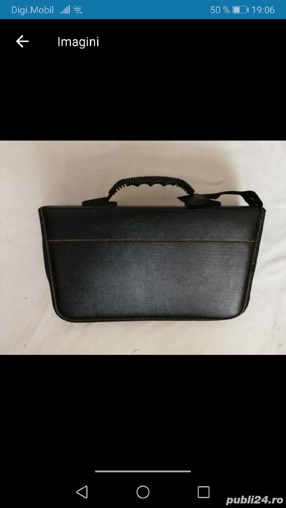 Vând borsetă CD DVD-uri, piele, 128 buc