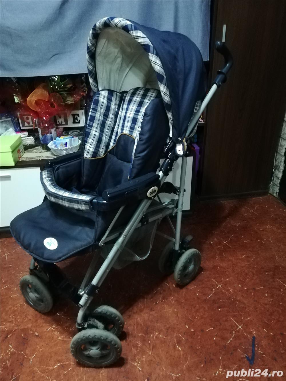 Carut copil din trei piese aproape nou marca - CAM / Italy , culoare albastru inchis . Carut copil din trei piese aproape nou marca - CAM / Italy , culoare albastru inchis .