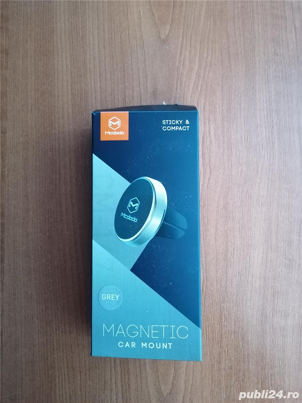 Vând suport magnetic auto pt telefon mobil! 