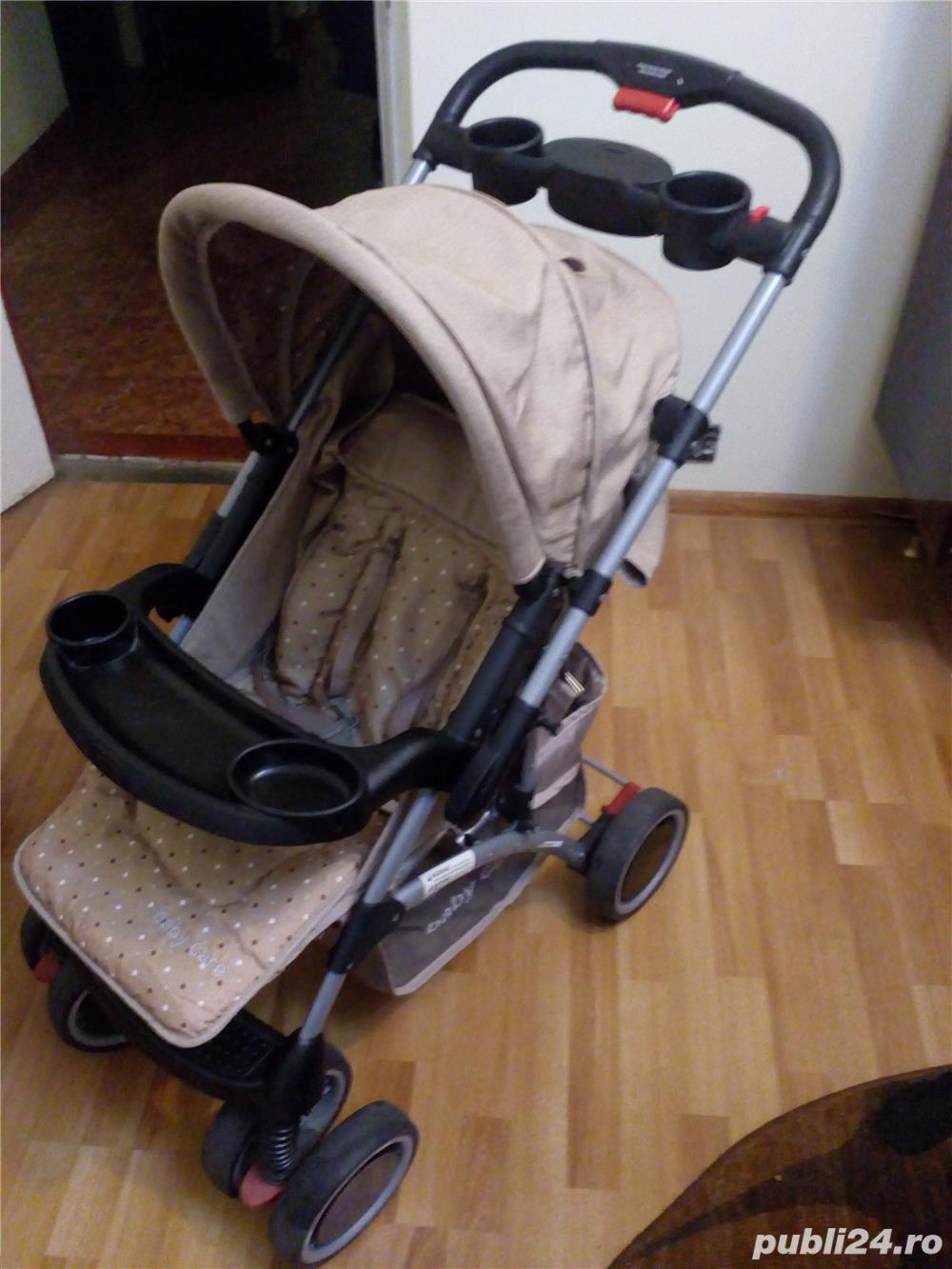 Carucior Baby Care cu maner reversibil - maro(utilizat) Carucior Baby Care cu maner reversibil - maro(utilizat)