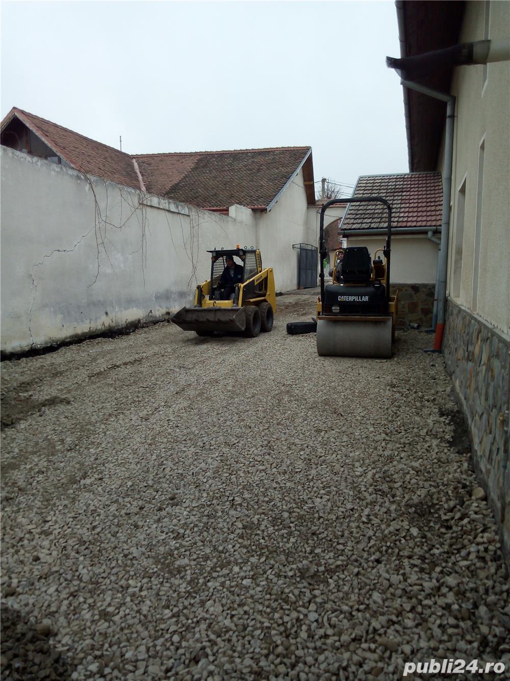 Buldoexcavator & basculanta