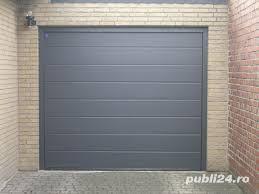 Instalam usi de garaj cu acces pietonal