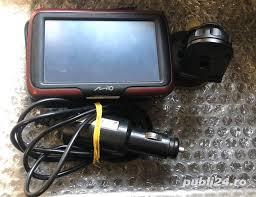 Vand gps Mio Moov M405 cu tot cu incarcator si garantie 12 luni