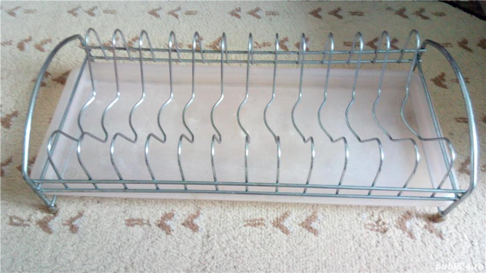 Suport vase cu scurgator.