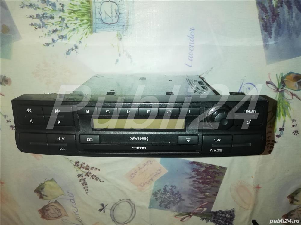 Casetofon, Volan,  Ansamblu manete si luneta spate original Skoda Octavia 2 Facelift 