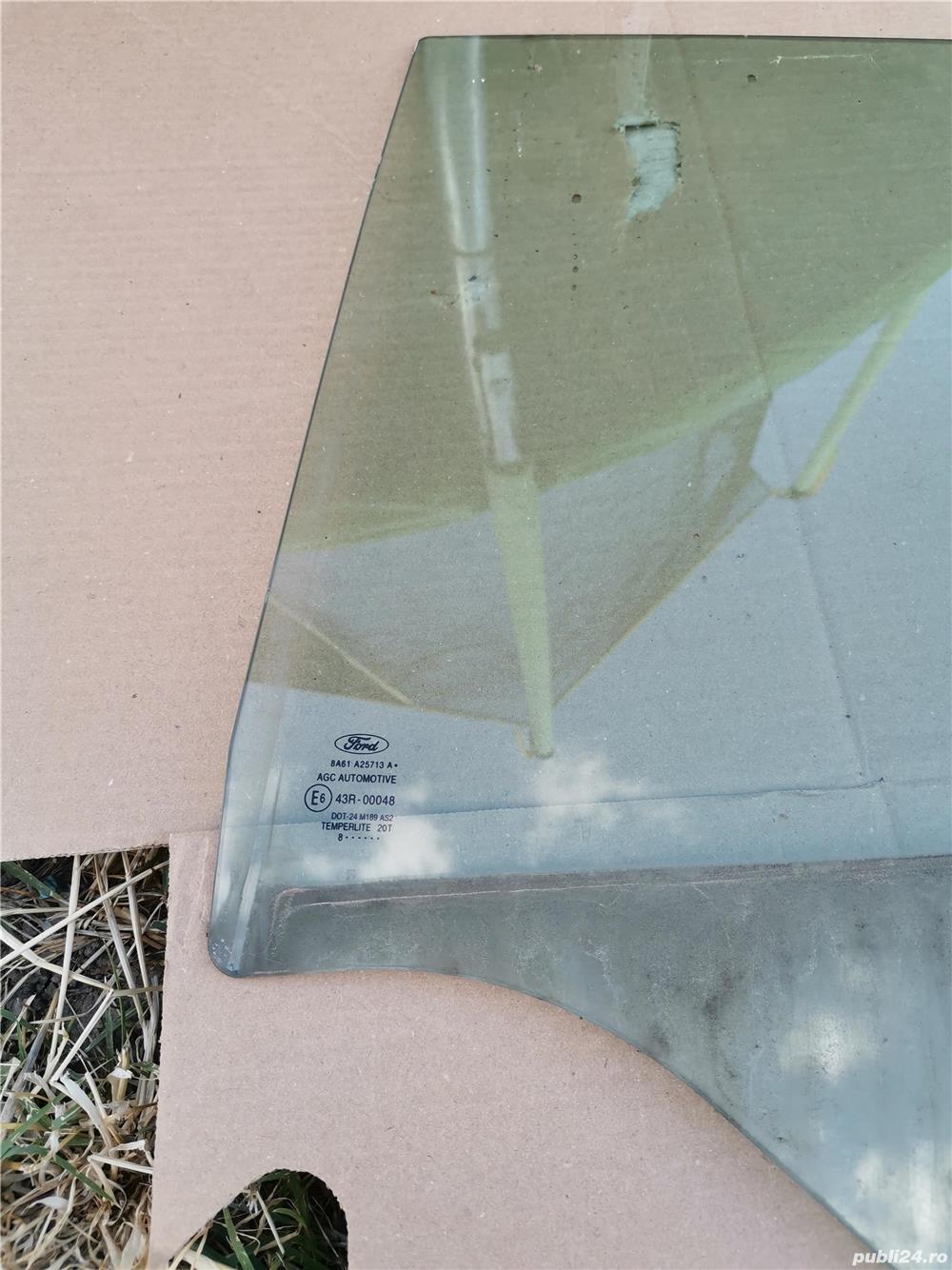 Geam ford fiesta stânga spate 2009