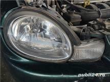 Chrysler/ Dodge Neon 2001 Far dreapta cu semnalizator si roata rezerva stare perfecta