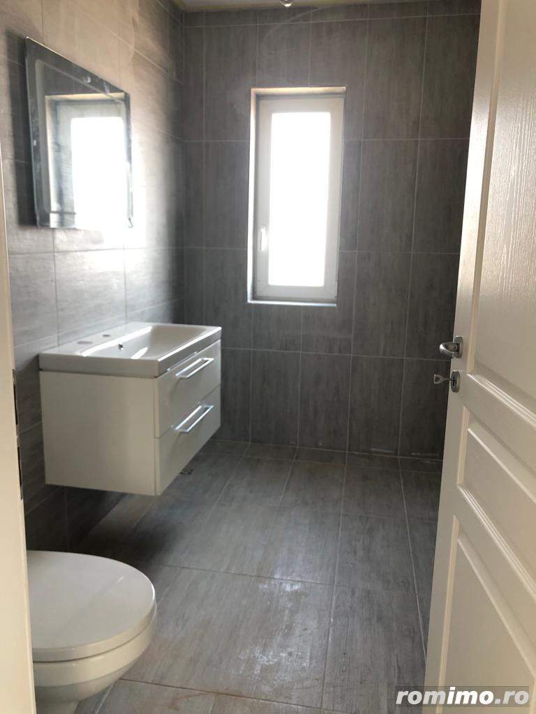 Apartament  2 camere 50 mp etaj 1 bucatarie inchisa+spatiu depozitare 25mp