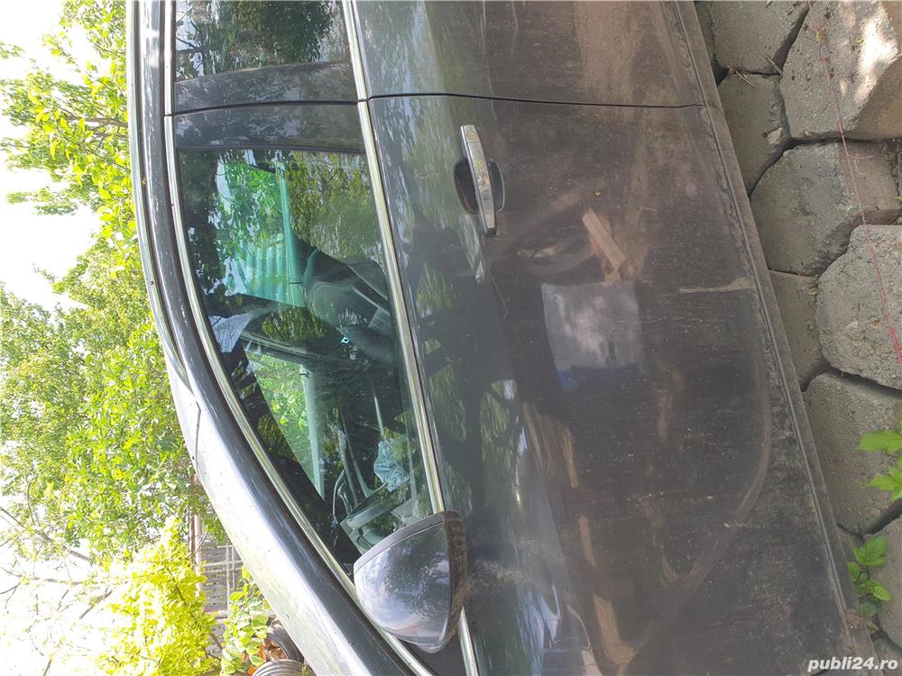 Vand usa cu oglinda elactrica fata/spate .