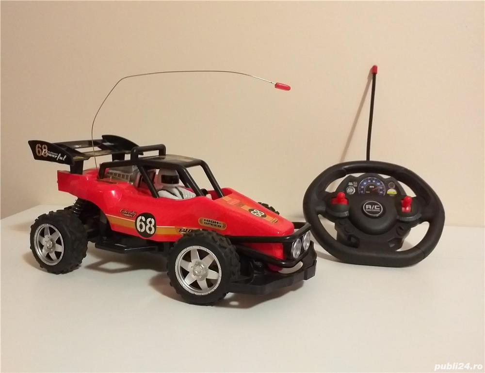masinuta telecomandata, teleghidata cu telecomanda, buggy raliu, sofer Stig Top Gear