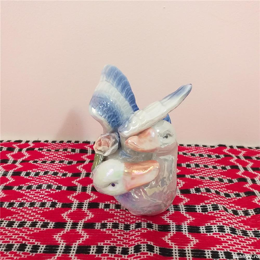 bibelou vechi portelan sidefat pasari de apa rata rate care se dau in barci :)