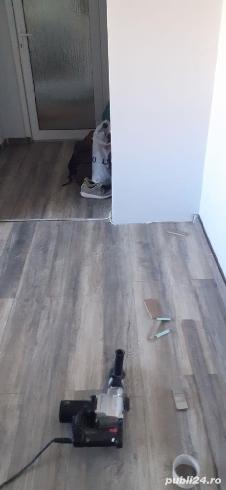 Execut lucrări de zugrăvit