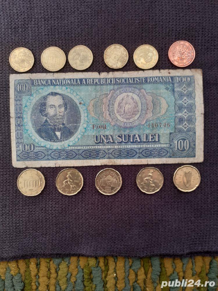 Bancnota de 100 lei cu Nicolae  Bălcescu si monede de 10 s20 eurocenti