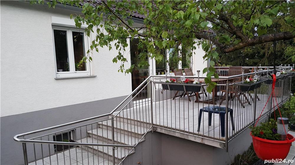 Balustradă din inox cu intermediare în plan vertical si prindere lateral