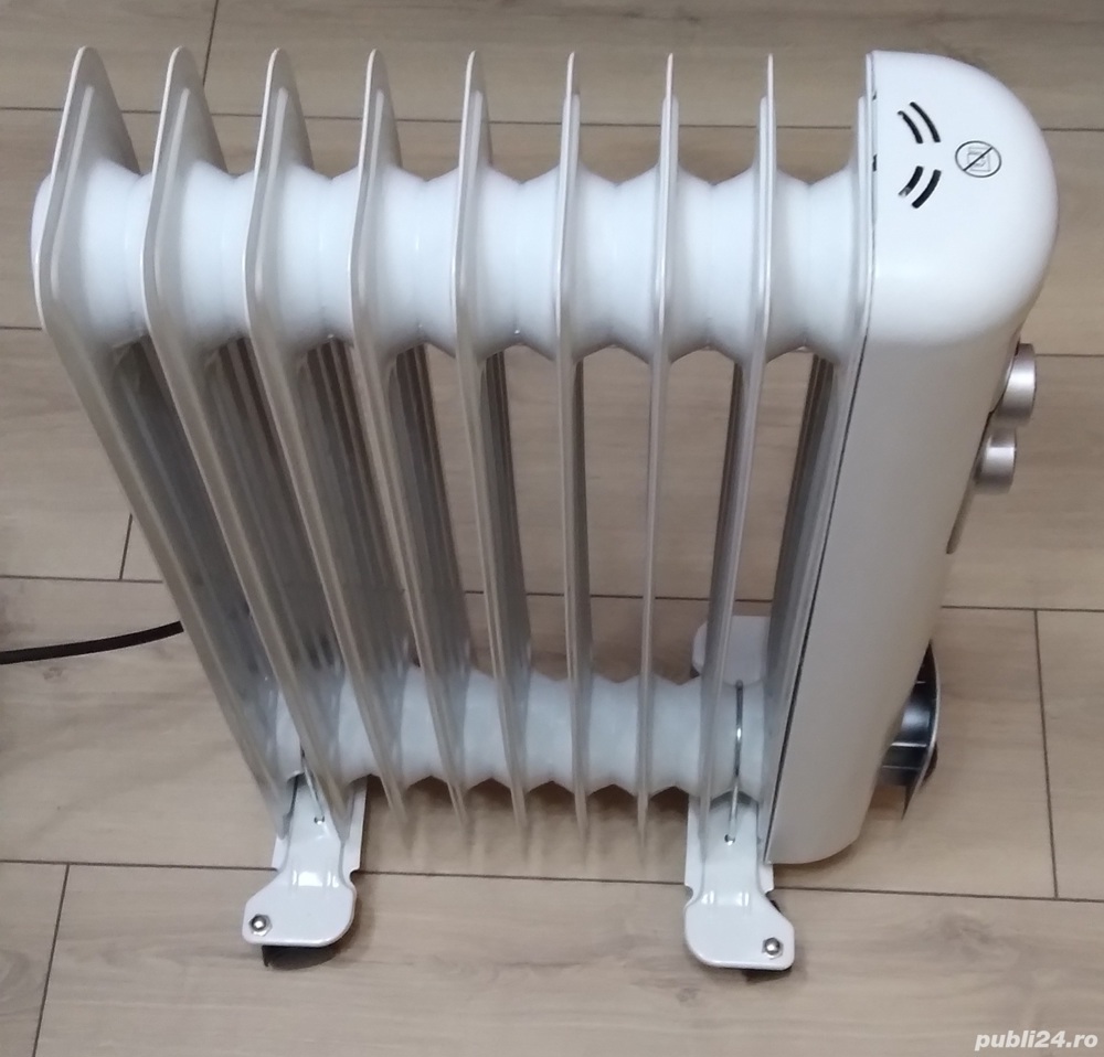 Calorifer electric, 2000 W, 9 elementi, 3 trepte de putere, Termostat reglabil,Nou!