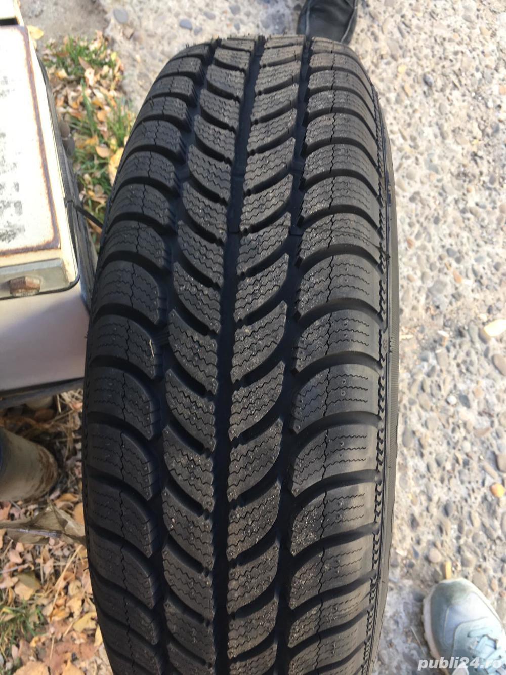 Cauciuc nou + janta tabla pe 14" ( CITITI ANUNTUL )