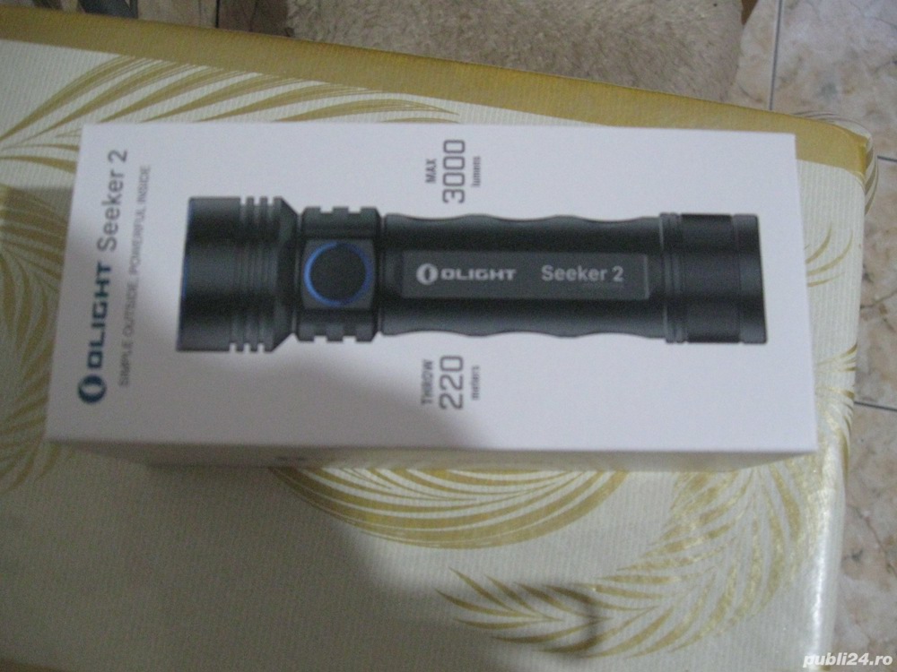 Lanterna Olight SEEKER 2 reincarcabila magnetic USB, noua,garantie.