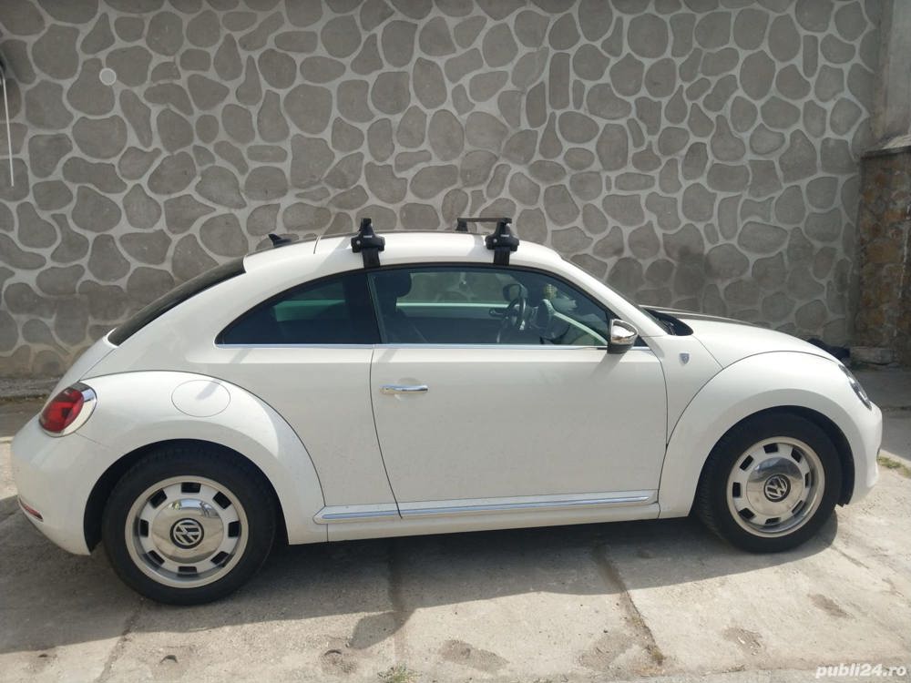 Bare transversale Thule Vw Beetle 2012>