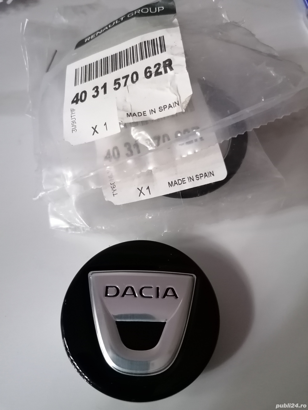 Capace originale pentru jenti aliaj dacia.