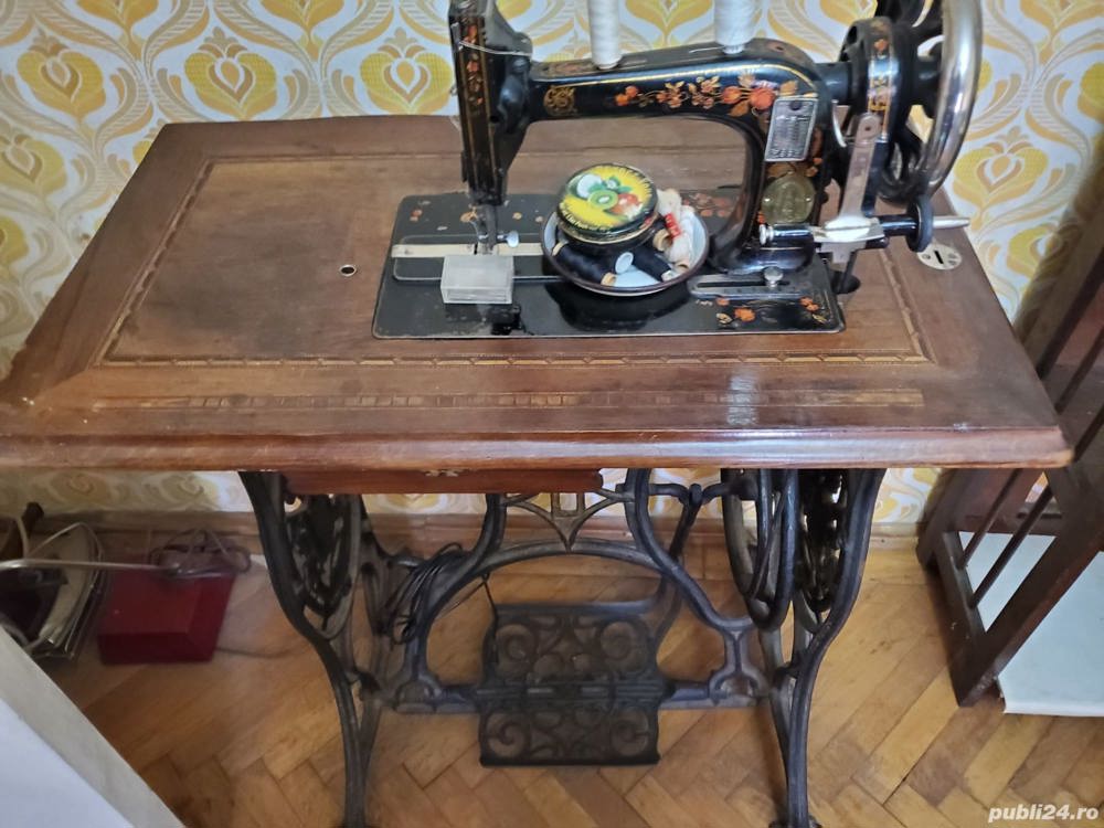 Masina de cusut Singer