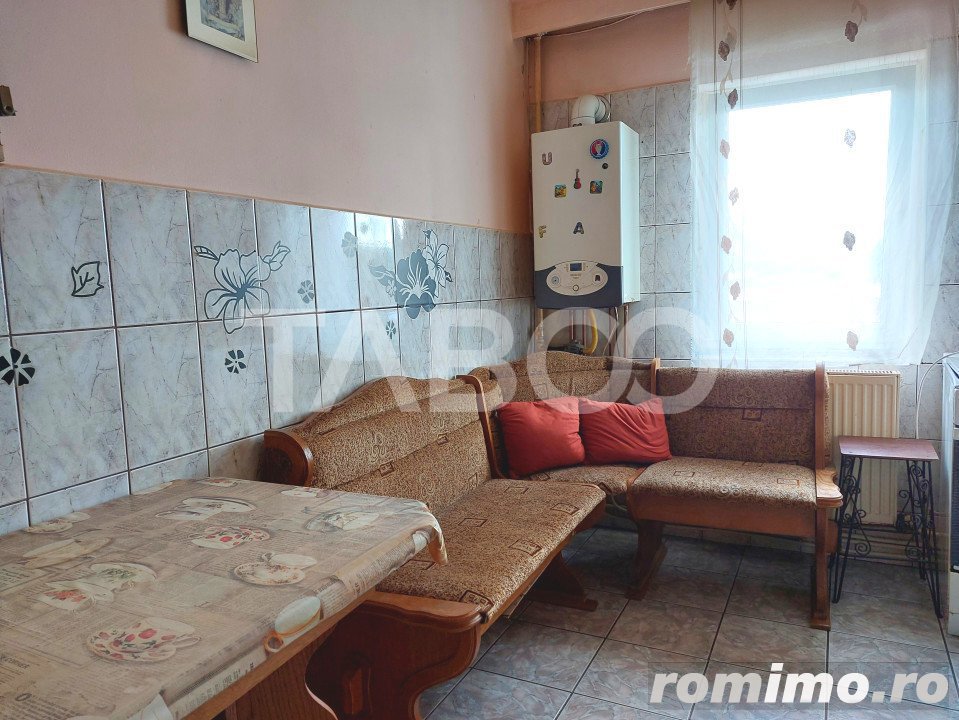 Apartament 65 mp 4 camere decomandate balcon Piata Noua Cisnadie