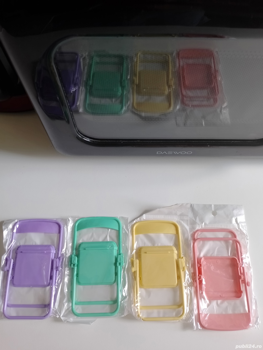 vand suport scaun pentru telefon diverse culori produs de calitate.