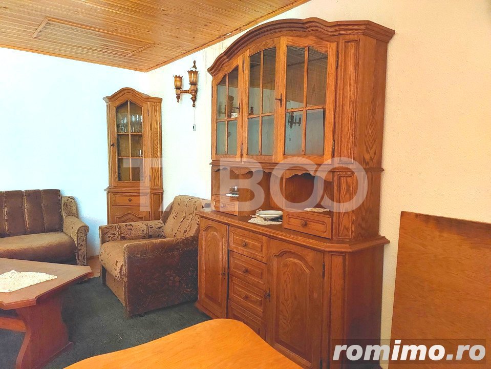 Casa de vacanta de vanzare 3 camere teren livada 1355 mp Tocile