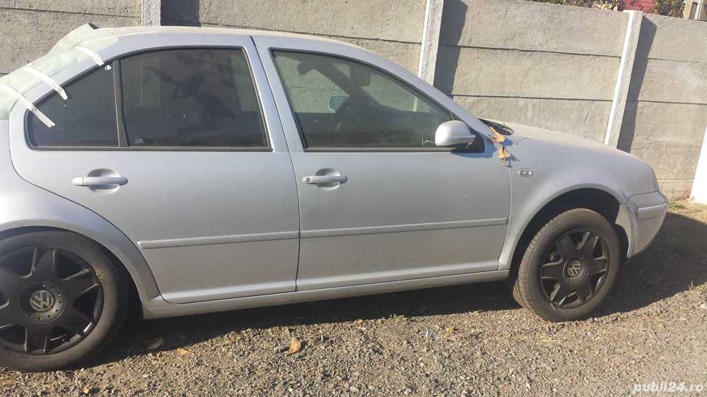 vand usi dreapta+stanga fata VW Bora an 2003 argintiu metalizat