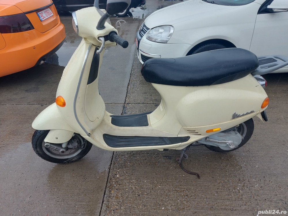 vând scuter vespa pe injecție 