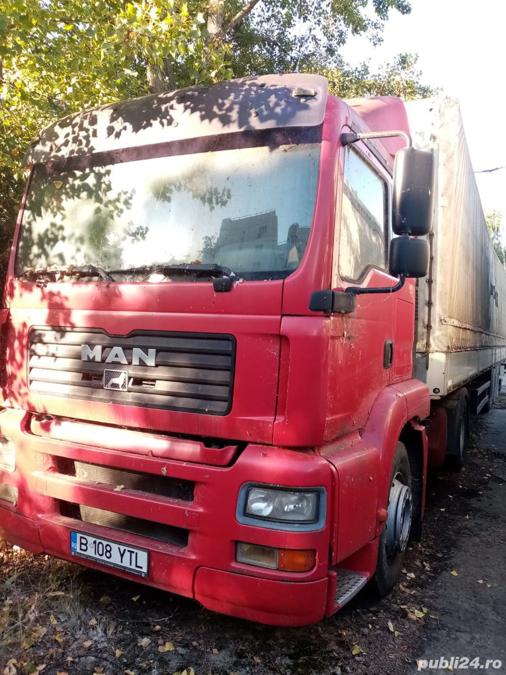 Tir MAN 24T cu remorca Schmitz H05 18.413FLSTGA18.410