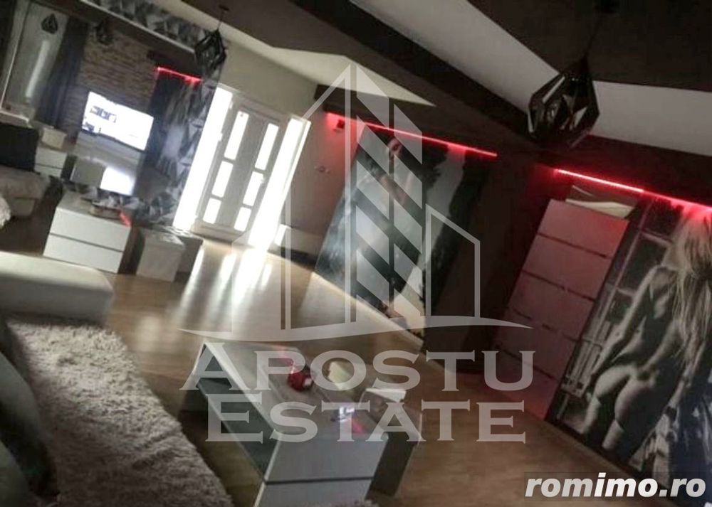 Casa individuala cu 7 camere si hala service,teren 600 mp,Dambovita