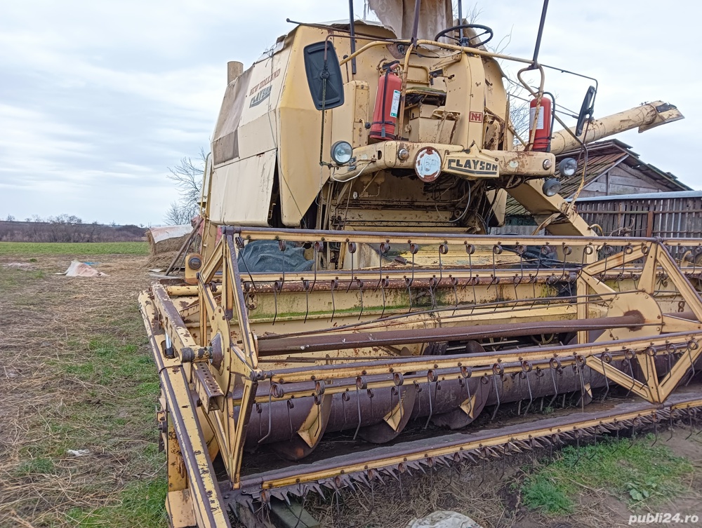 Vând combina new holland