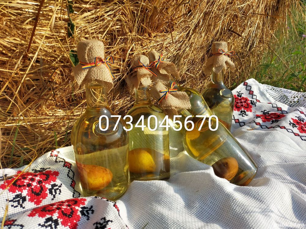 Pară în sticlă cu pălincă și gutui în sticlă cu pălincă 