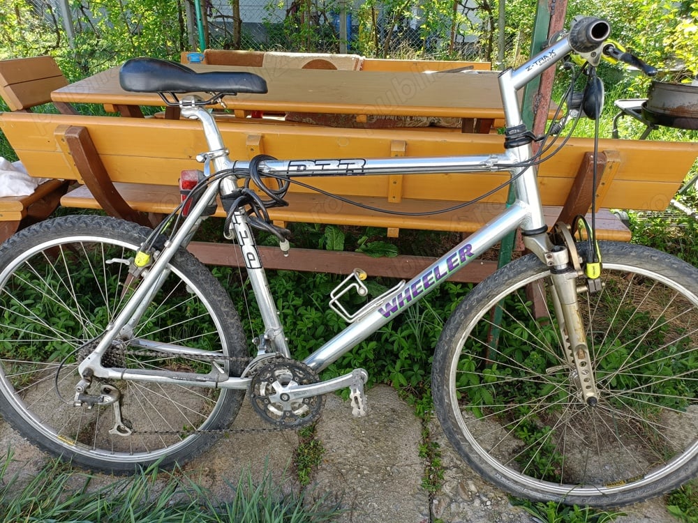 Vând bicicletă bărbați tip WHEELER cadru de aluminiu.