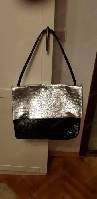 Poseta piele naturala, culoare negru-argintiu, stare foarte buna, transport gratuit