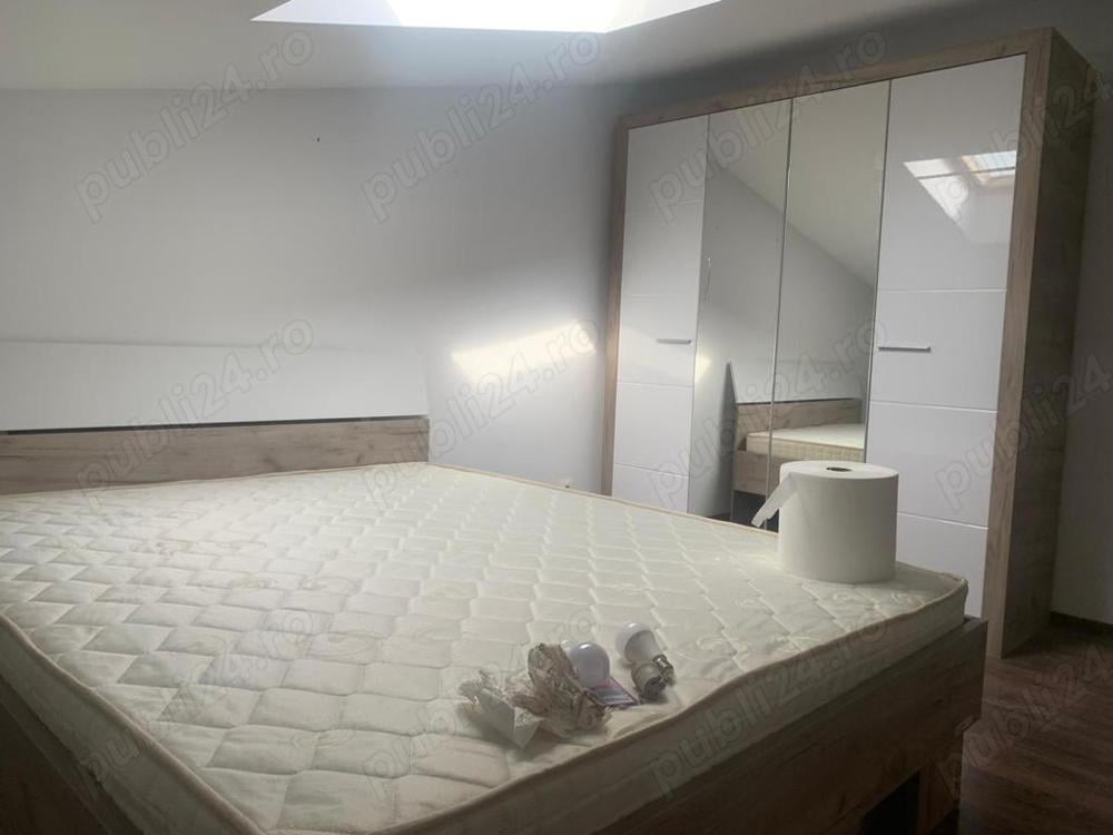 Apartament mansardat 74mp