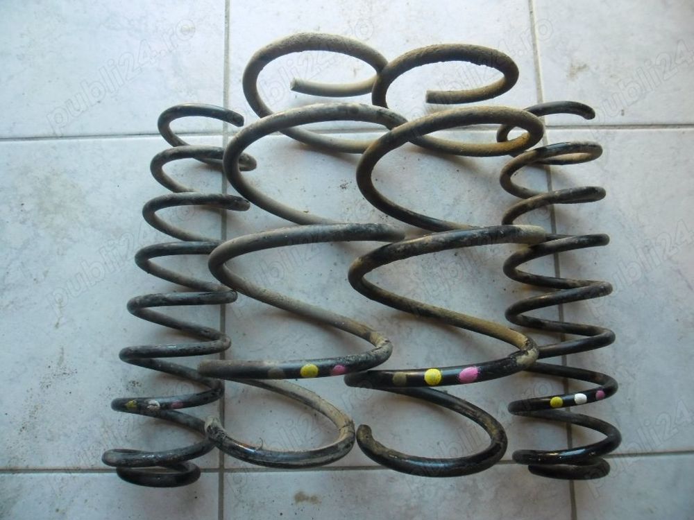 Set arcuri Renault Fluence fata-spate .