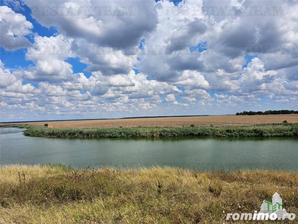 Teren construibil cu toate utilitatile
