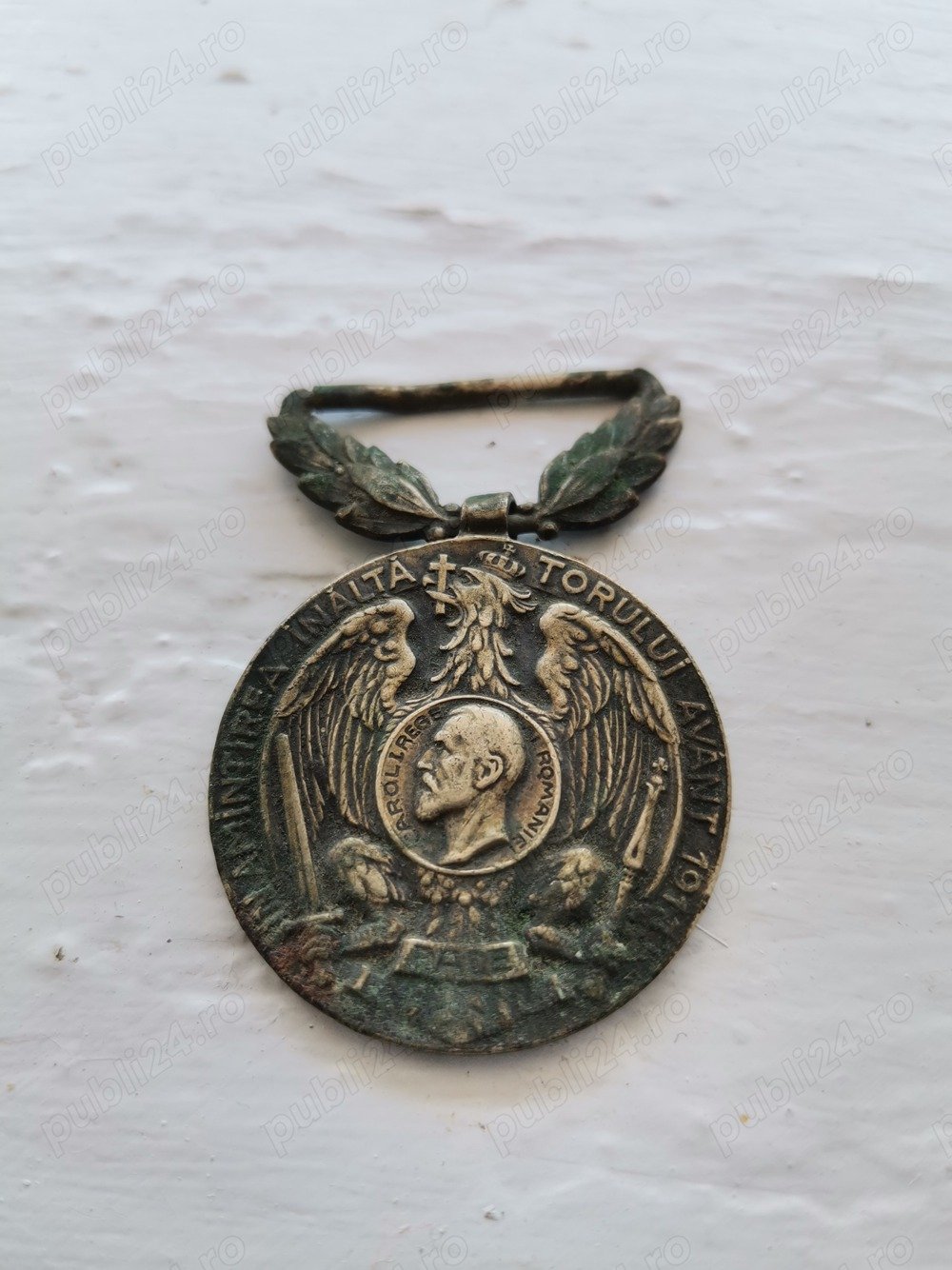 Insigne , monede romanesti din ani 180