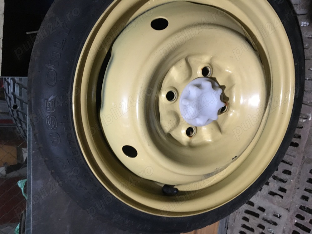 Vand roata rezerva Toyota Yaris (model 2000-2005) si capace originale, roti R14.