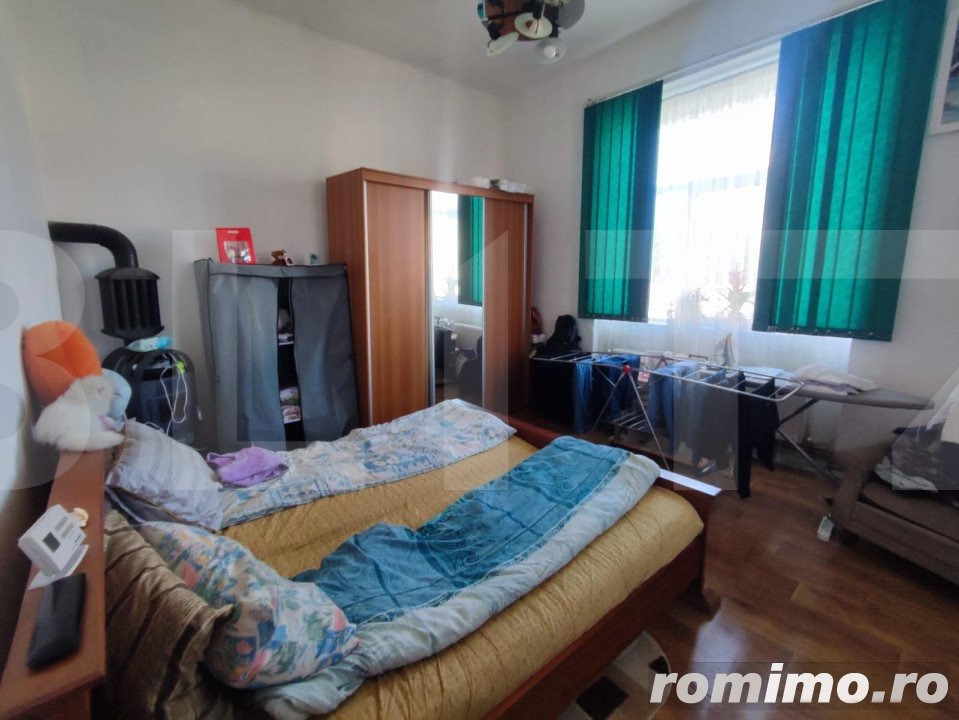 Apartament la casa , posibilitate spatiu comercial .