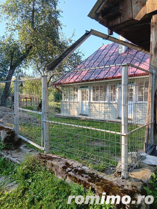 Casa la munte, teren 8324 mp, anexe, zona comuna Bucium